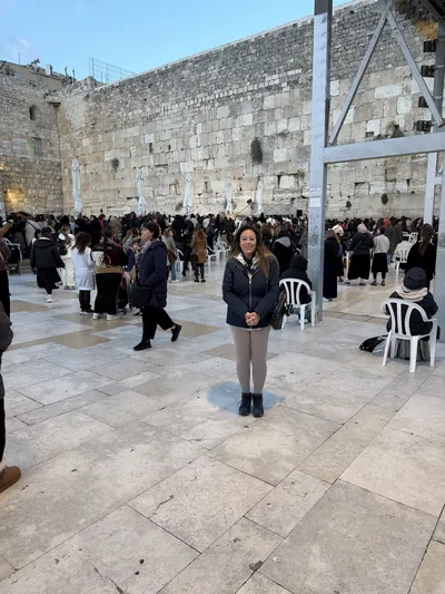People gathered on a stone plaza