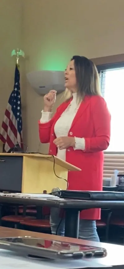 Christine Leeviraphan teaching from a lectern
